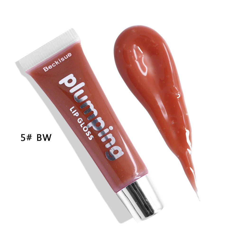 Brillo de labios húmedo con efecto volumen de cereza.