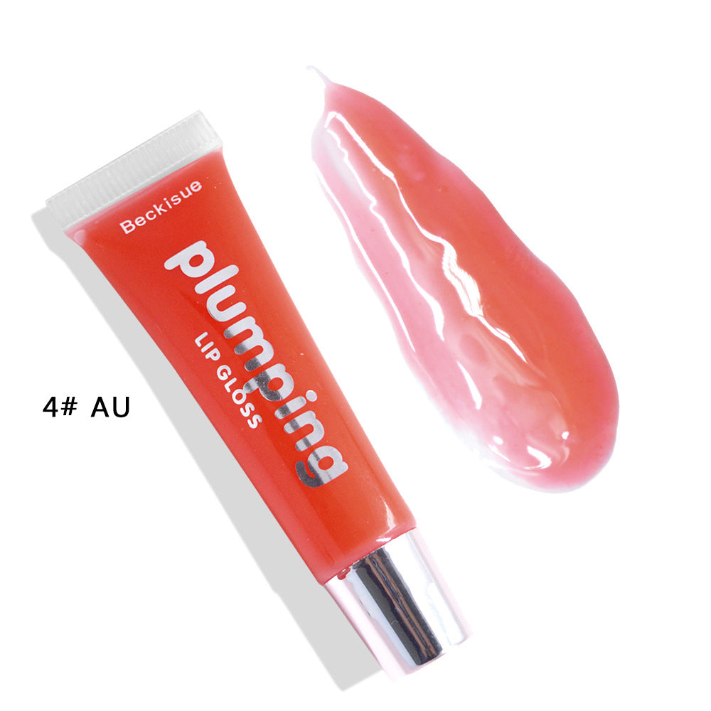 Brillo de labios húmedo con efecto volumen de cereza.