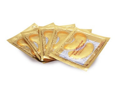 Mascarilla de colágeno con cristal dorado para ojos.